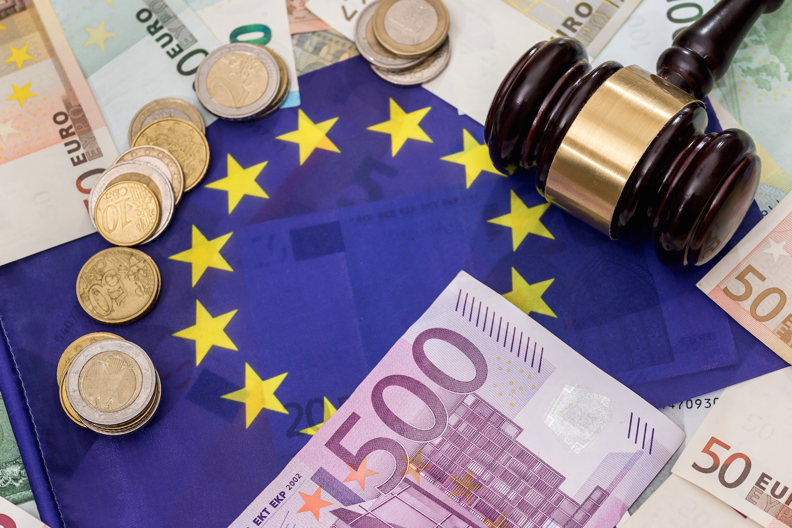 euro money, flag and gavel