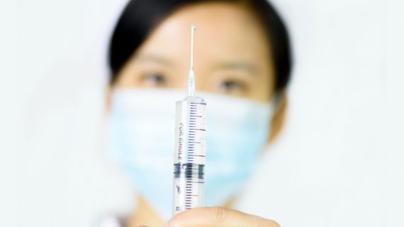 Chinese nurse with a vaccine DPT Vaccines Recalled in China