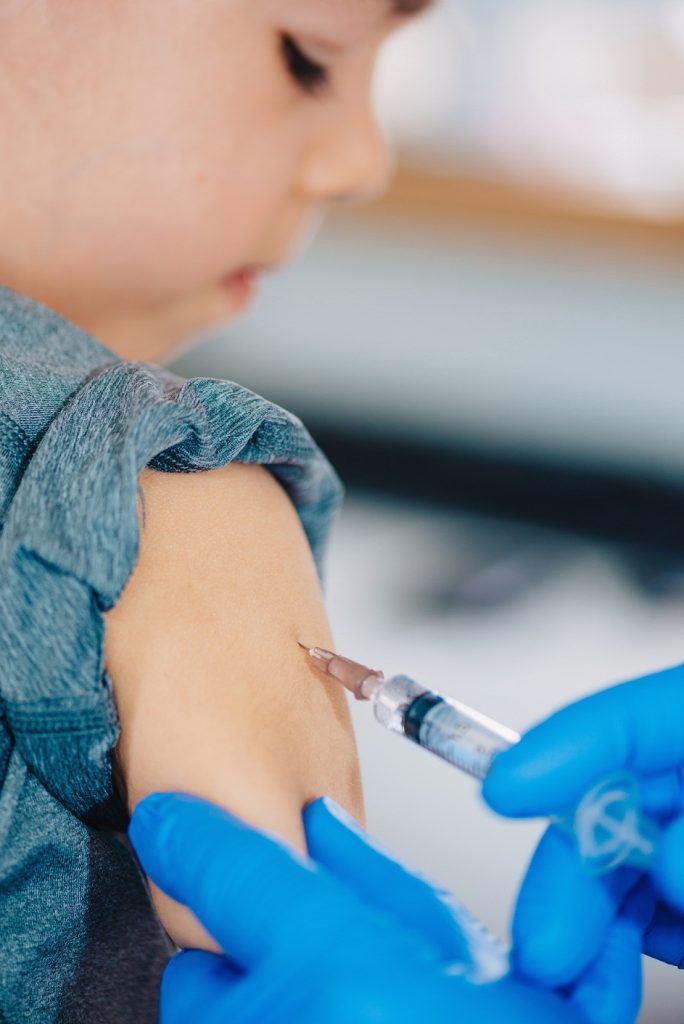 little girl gets vaccine