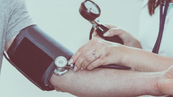 taking blood pressure Redefining Hypertension: A Redefinition Throwback to Polio