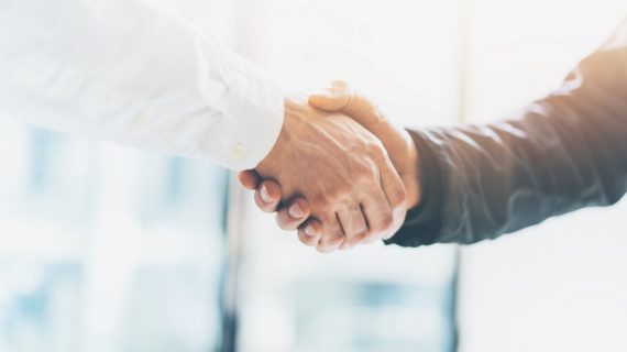shaking hands Big Pharma Pays Universities for Most Medical Research in U.S. Today