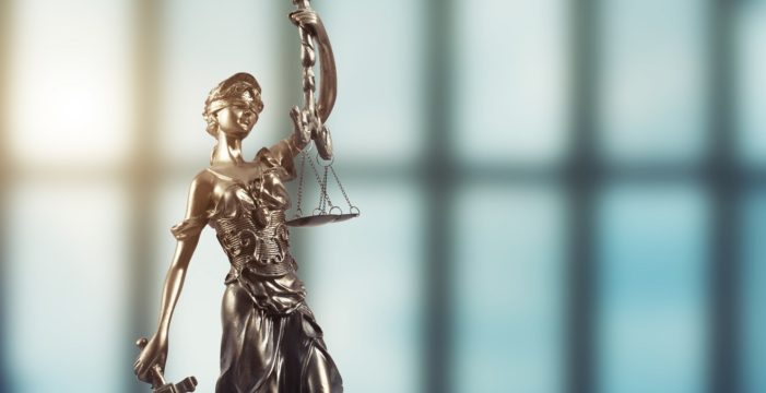 statue of lady justice Lawsuit Alleges Migrant Children Given Psychotropic Drugs Without Parental Consent