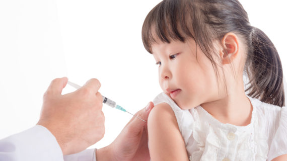 Girl getting vaccinated in China Vaccine Scandal in China Crosses “Moral Bottom Line”