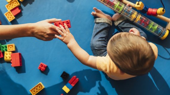 preschooler playing New York to Require Flu Shots for Preschoolers, California Moves to Eliminate Vaccine Exemptions for the Poor