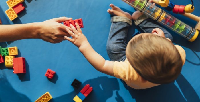 preschooler playing New York to Require Flu Shots for Preschoolers, California Moves to Eliminate Vaccine Exemptions for the Poor