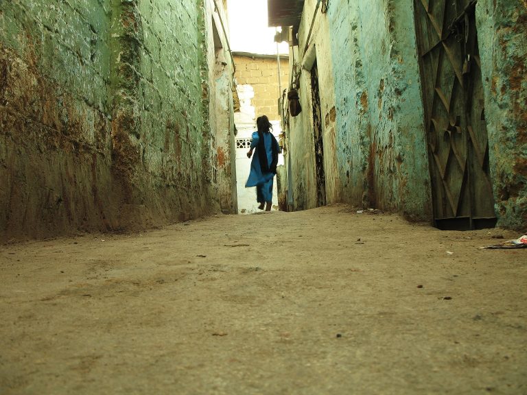 Indian girl in alley