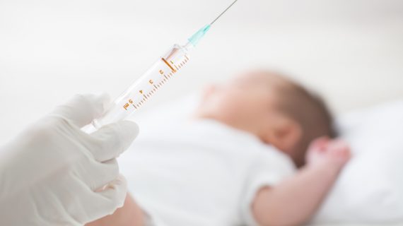 vaccine syringe and infant Doctors Claim it is Safe to Vaccinate Kids Even After Vaccine Reactions