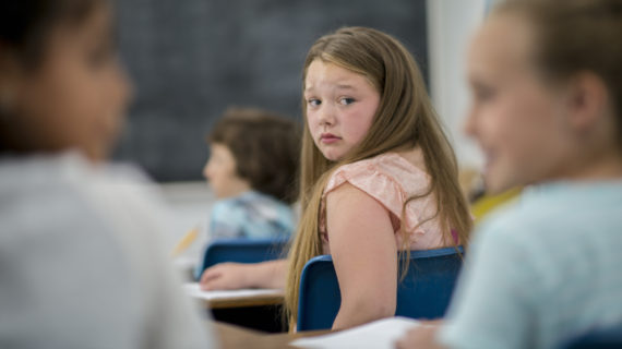 girls in classroom Children Given Flu Shots in School Classrooms