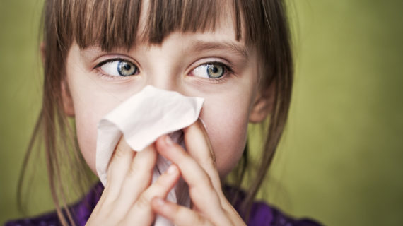 girl blowing her nose Seriously. A Vaccine for the Common Cold?