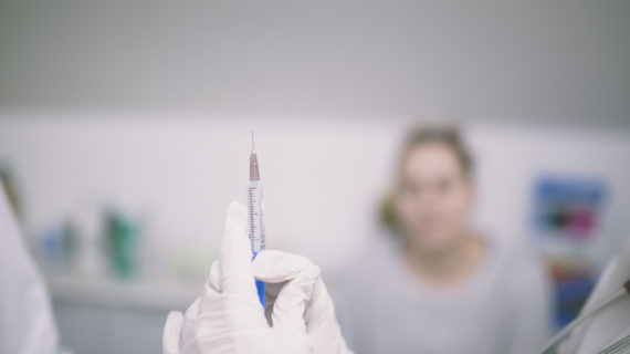 doctor with a vaccine Why Doctors (and Newspaper Columnists) Rarely Dare to Question Vaccine Safety