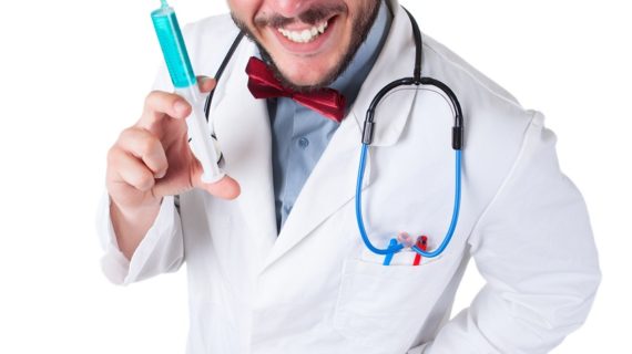 doctor holding a syringe Golden Globes’ Bizarre Flu Shot Shtick Backfires