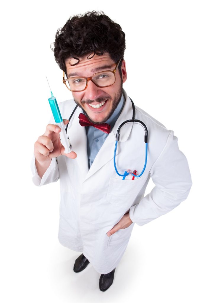 doctor holding a syringe