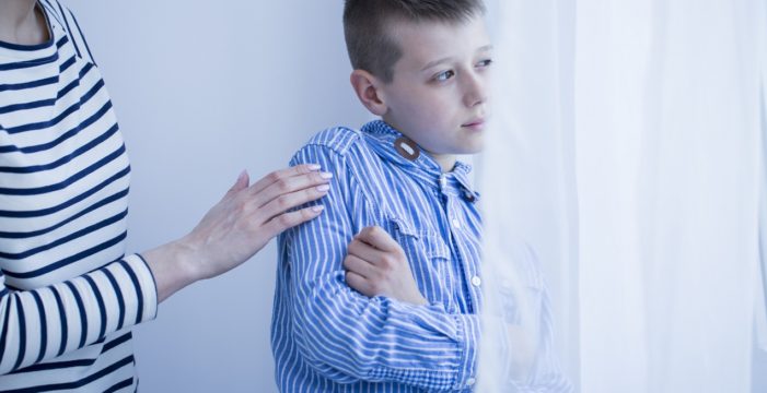 autistic boy staring out the window Minnesota Establishes Autism Council