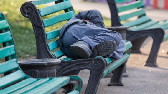 sleeping on a bench All Homeless People to Get Hepatitis A Vaccine