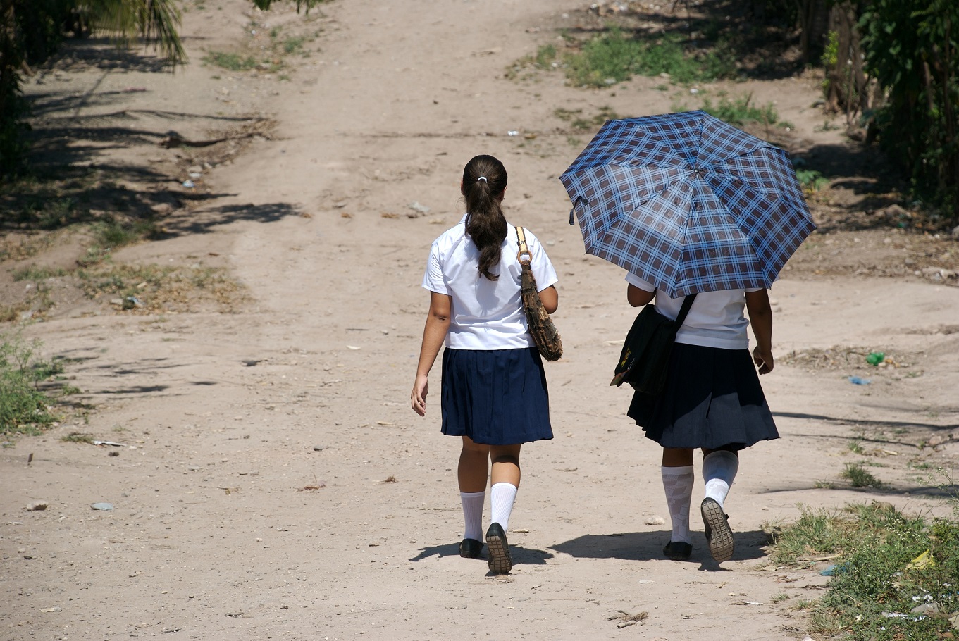 Central American school girls walking