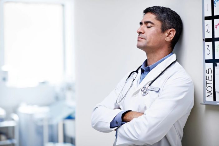 doctor leaning against the wall Big Shortage of Doctors for Chronically Ill Americans