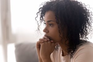 African-American woman in thought