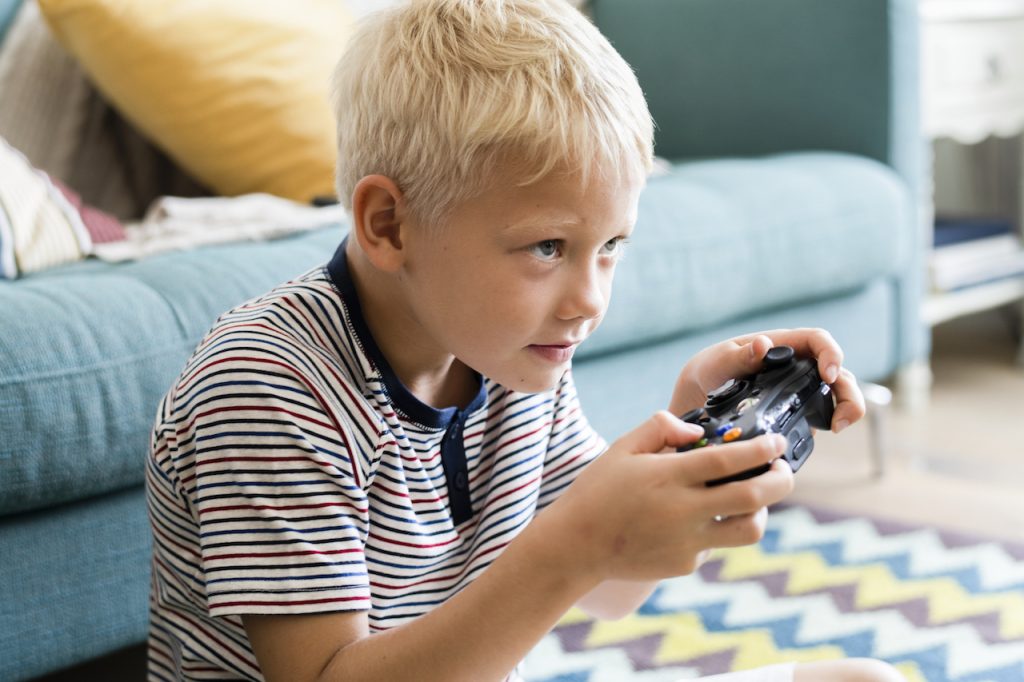 boy playing a video game
