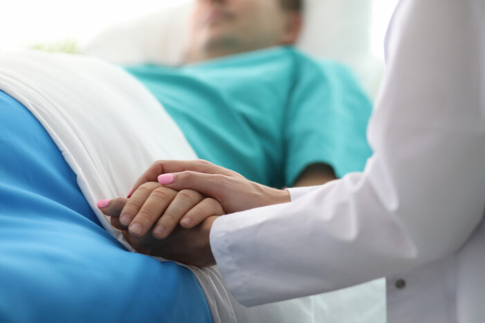 holding man Man in Nebraska Dies Less Than Two Weeks After Getting COVID-19
