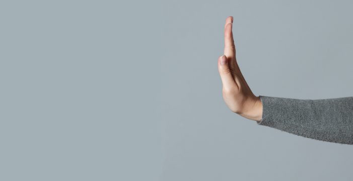 outstretched hand Nordic Nations Suspend Use of Moderna COVID Shot Over Heart Inflammation Concerns