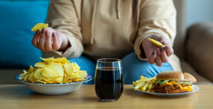 eating junk food Science Behind COVID and Diet-Related Disease Largely Overlooked by U.S.