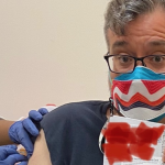 Carlos Tejada gets COVID shot