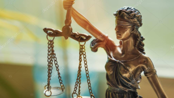 lady justice U.S. District Court in Texas Blocks Federal Employee COVID Vaccine Mandate