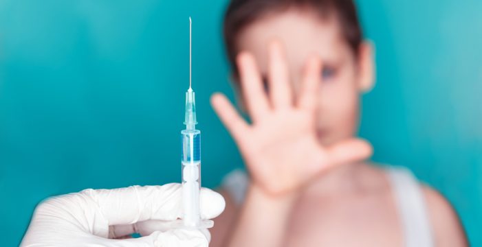 Public Skepticism Over COVID Shots Fuels Growing Vaccine Hesitancy