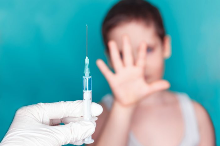 Public Skepticism Over COVID Shots Fuels Growing Vaccine Hesitancy