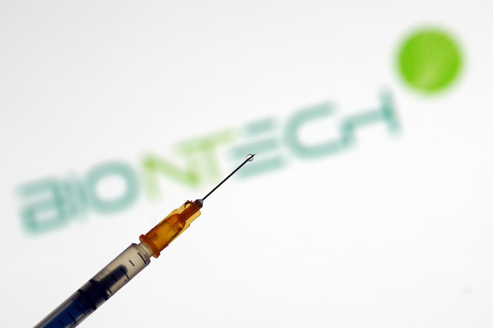 BioNTech and syringe