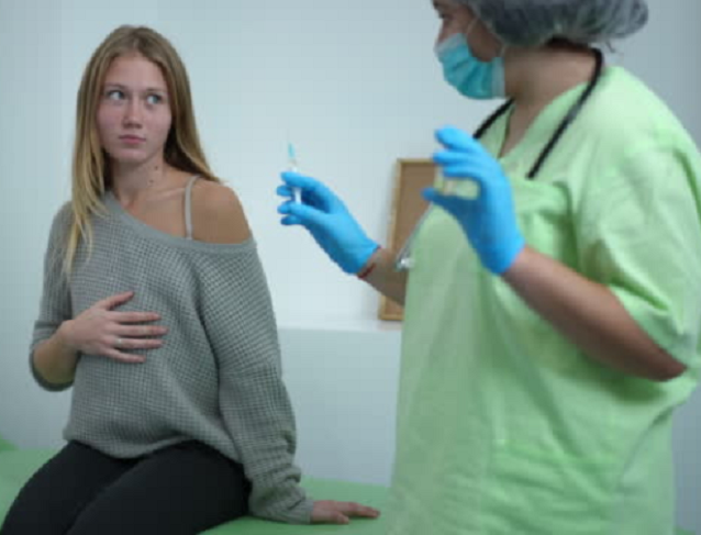 pregnant woman refusing vaccine