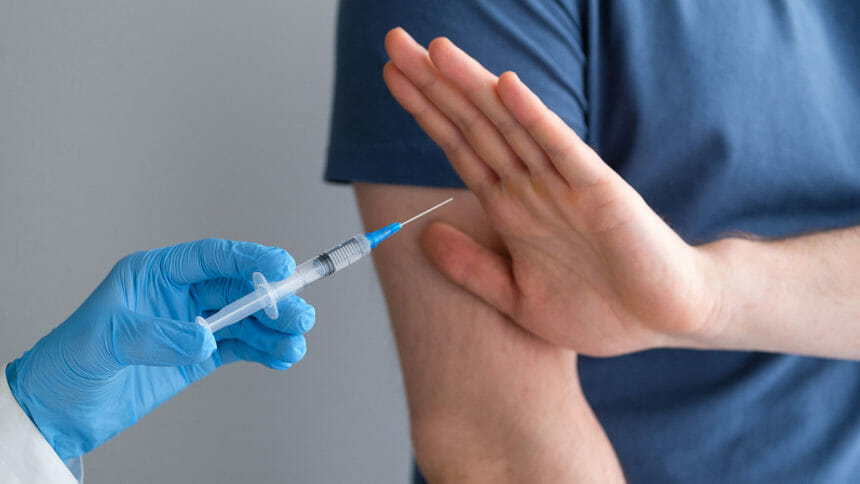 man rejecting vaccine