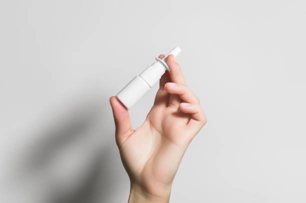 holding a FluMist bottle